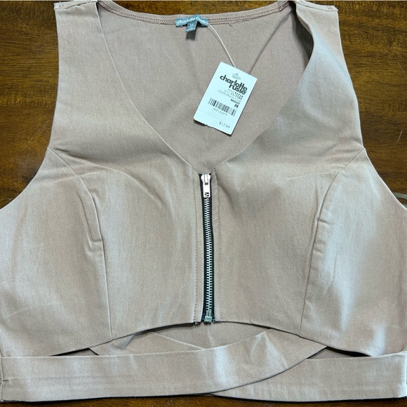 Mauve colored top and shorts.
Stretchy - Picture 9 of 12